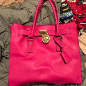 Authentic large magenta Michael Kors Bag.